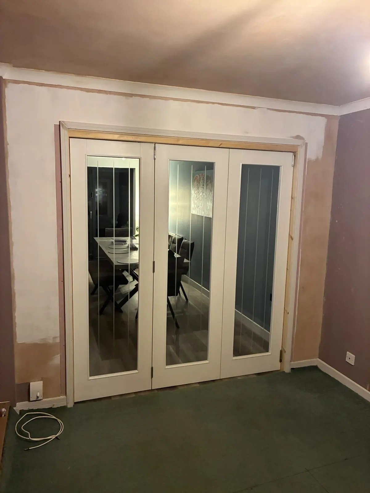 Internal glazed bifold doors – carpentry by JCK Carpentry & Building, Exeter