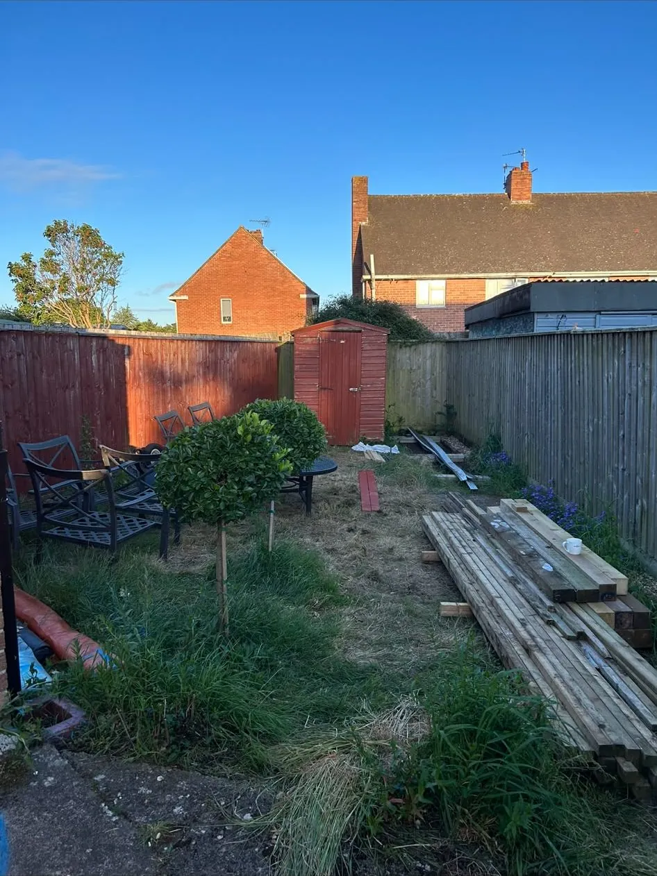 Garden raised beds and decking in Exeter before work by JCK Carpentry & Building
