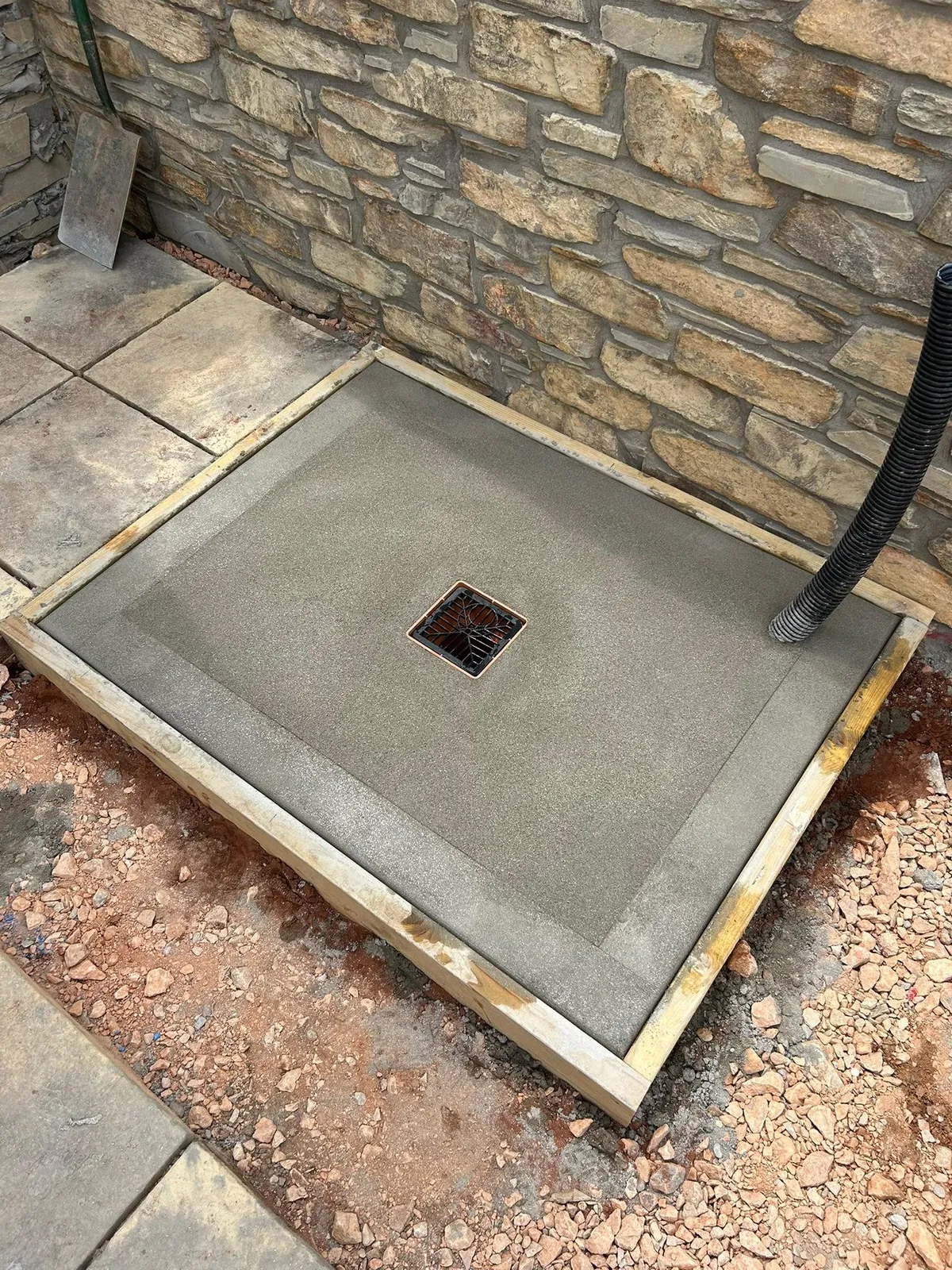Outdoor concrete base drain 03 – patios, paving & outdoor work by JCK Carpentry & Building, Exeter