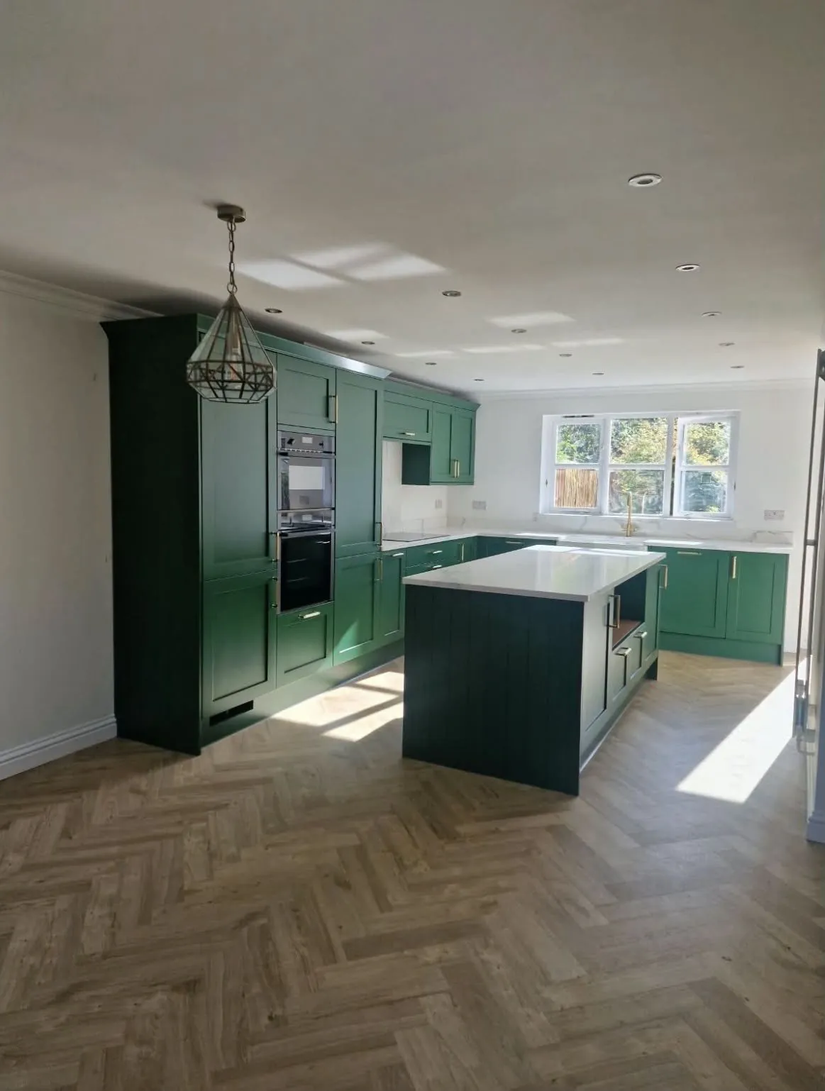 Green shaker kitchen island 22 – kitchen fitting by JCK Carpentry & Building, Exeter