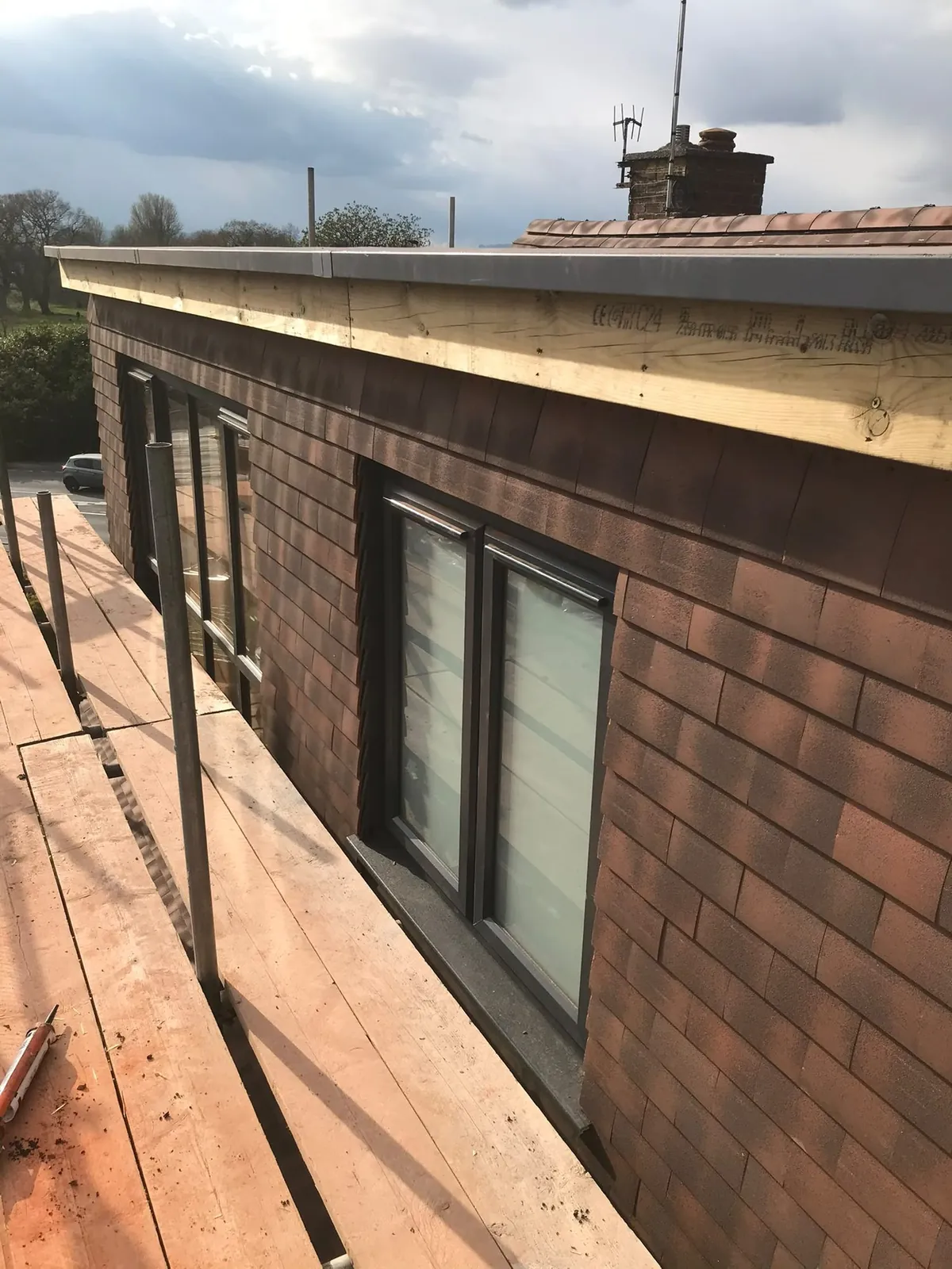 Tile hung extension fascia – extensions & building work by JCK Carpentry & Building, Exeter