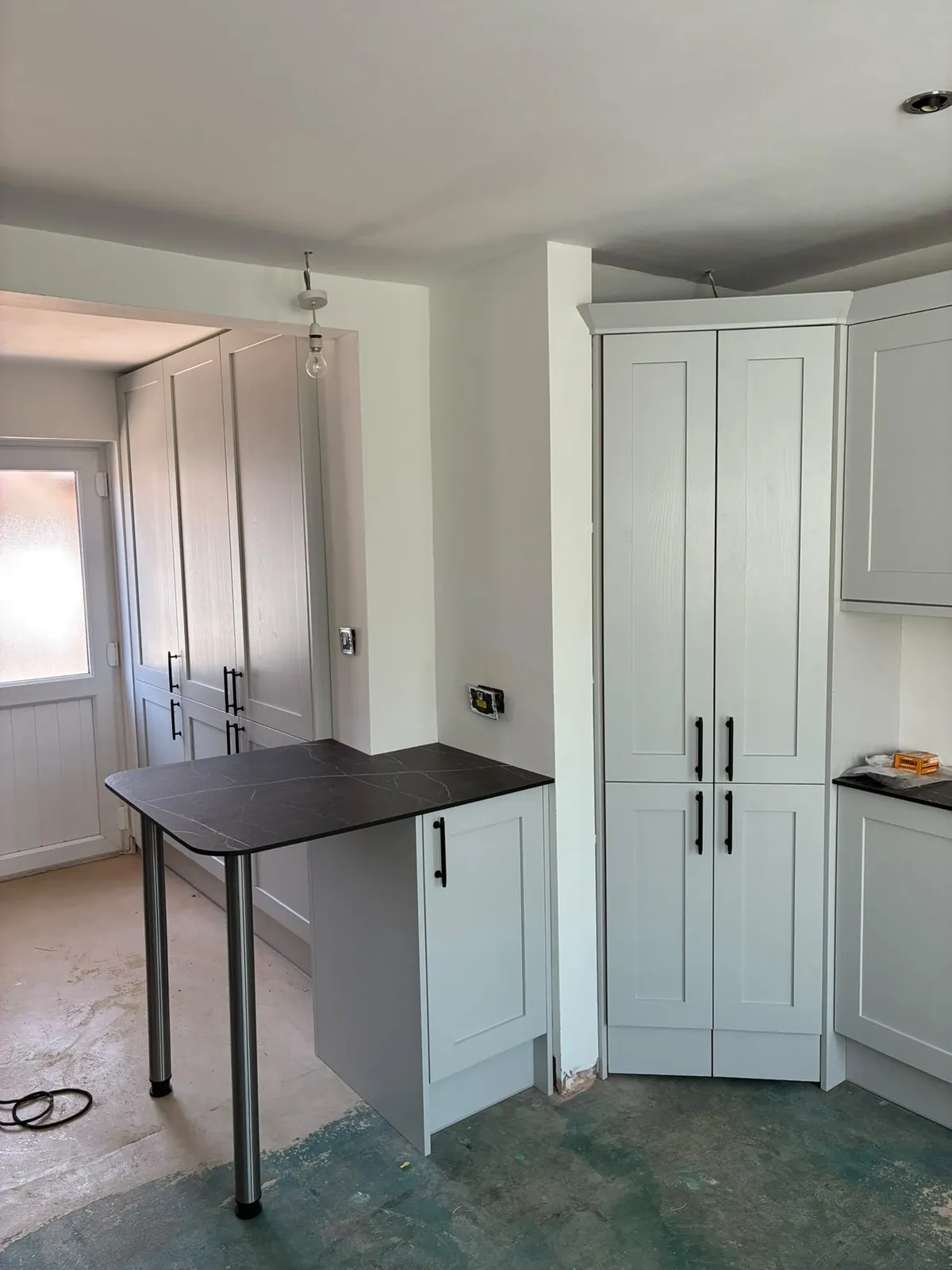 Grey shaker kitchen breakfast bar – kitchen fitting by JCK Carpentry & Building, Exeter