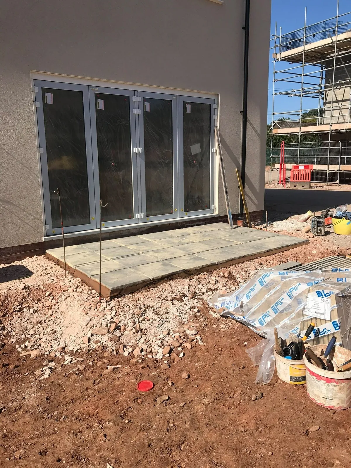 Patio slabs bifold doors 02 – patios, paving & outdoor work by JCK Carpentry & Building, Exeter